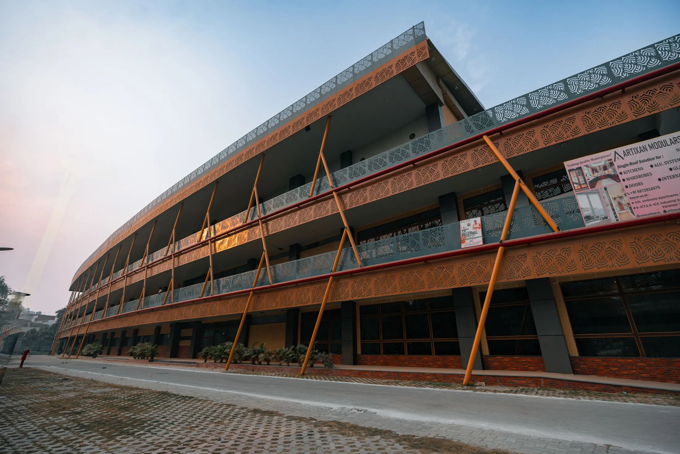 The senior block of Magnus International School, three floors with timber sunshades
